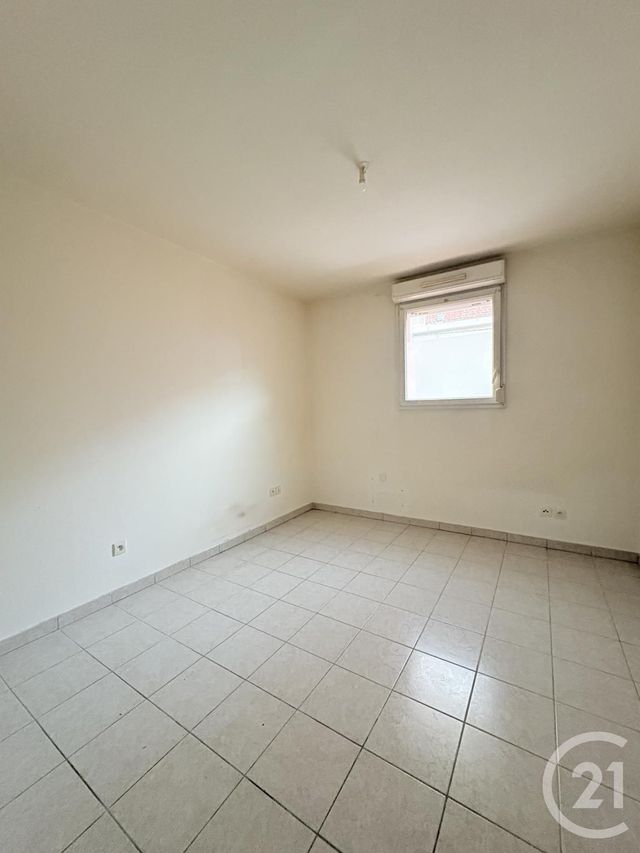Afficher la photo en grand Appartement T2 à louer - 2 pièces - 50.5 m2 - ST QUENTIN - 02 - PICARDIE - Century 21 Faubourg D'Isle